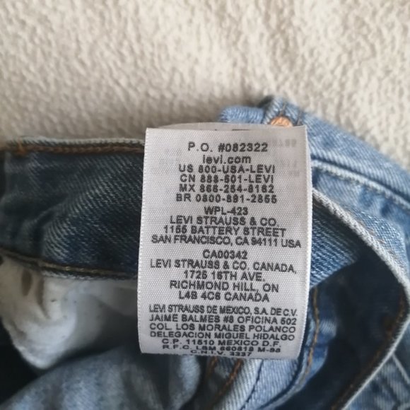 Levi's 505 Medium Wash High Waisted Distressed Denim Shorts - Picture 5 of 13